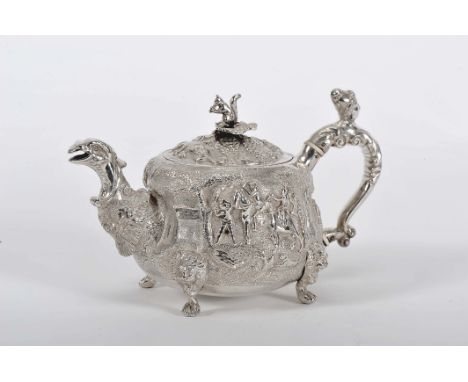 A teapot, Regency (1811-1820), 958/1000 silver, decoration en relief "Landscapes with hunters and musicians" and "Vine leaves