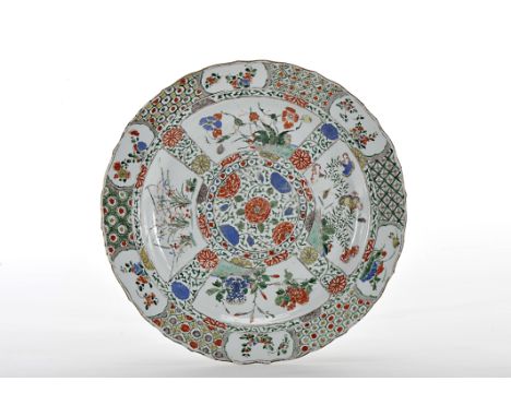 A large platter, Chinese export porcelain, "Famille verte" polychrome decoration "Flowers", Kangxi period (1662-1722), secure