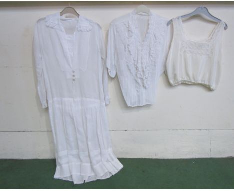 Three items of early 20th Century ladies' clothing, white blouse with lace tapering frill front, white lawn cotton long sleev