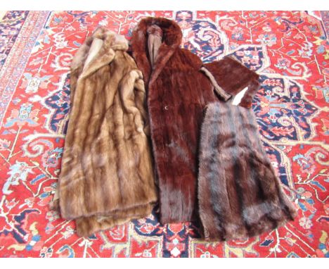 A "Revelation" suitcase containing a Mid Century "K. West", London mid brown mink fur coat with stylised buttons, a chestnut 
