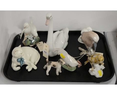 A selection of decorative ceramic animal figures, including: a Lladro figure of a swan, 21.5cms high; a B &amp; G Copenhagen 