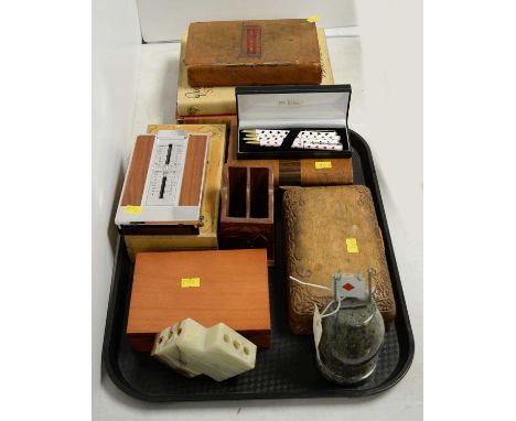 A selection of gaming and desk accessories, including: a Rolyat craft dredge box; a set of four Mr. Bridge pens; a card box w