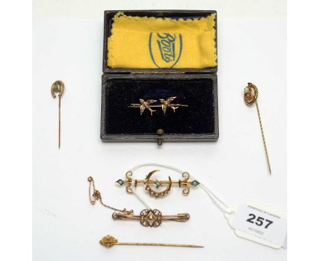 A selection of brooches and tie pins, including: a turquoise and seed pearl set crescent bar brooch; a seed pearl set swift p