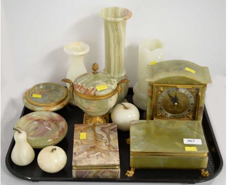 A collection of decorative onyx and hardstone items, including: a gilt metal mounted onyx urn vase and cover, with eagle-shap