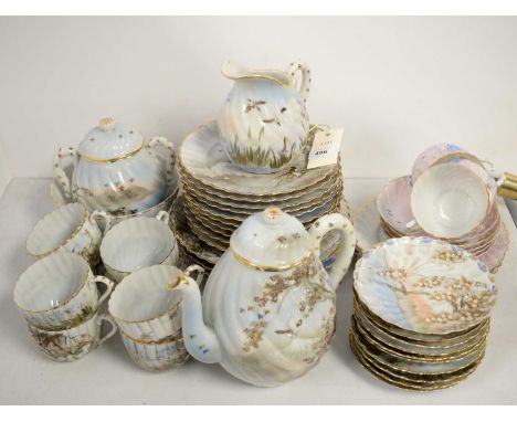 A Japanese eggshell porcelain tea service, including: eight tea trios, teapot, cream jug, sucrier, sugar bowl, sandwich plate