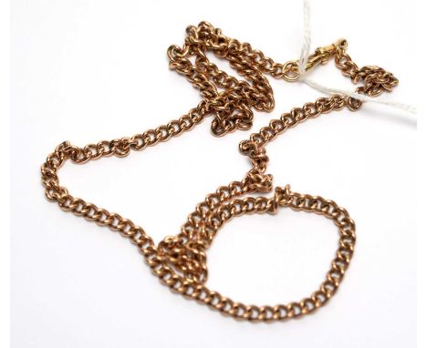 A 9ct yellow gold albert chain, of curb links with clasps, 72cms, 55.3g. 