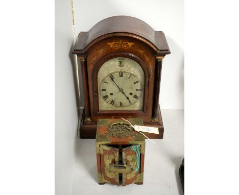 An Edwardian inlaid mahogany bracket clock, the domed architectural case with pillar supports, 41cms high; together with a br