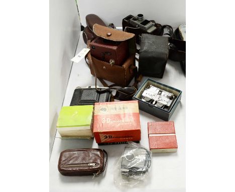 A collection of cameras and camera accessories, including: a Zeiss Ikon Contaflex camera, in carrying case; a GB-Bell &amp; H