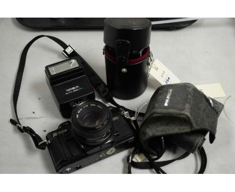 A Minolta X-700 SLR camera and 50mm lens; a Minolta auto 280PX flash; together with a Fujica GER compact camera; and a Tamron