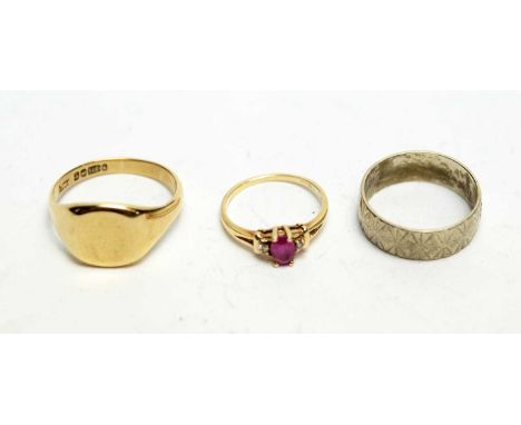 A 9ct white gold wedding band, of faceted design; a 9ct yellow gold signet ring; and a synthetic ruby and diamond ring, on 9c