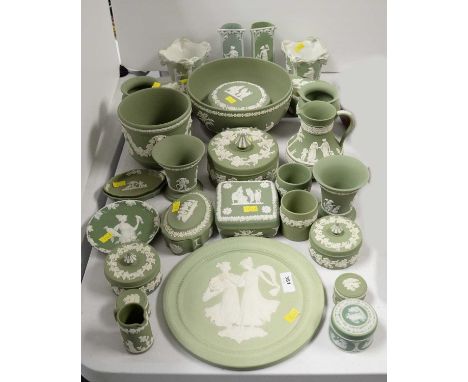 A collection of Wedgwood Jasperware, each in green, including: a bowl; pin dishes; trinket boxes with covers; jugs; and other