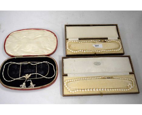 A selection of pearl necklaces, including: Georgian pearl necklet with two tassel drops; single strand pearl necklace with pe