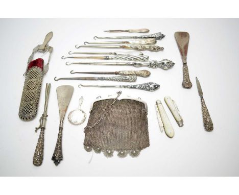 A selection of button hooks with silver filled handles; a chain mail purse; two silver bladed knives, with mother-of-pearl ha