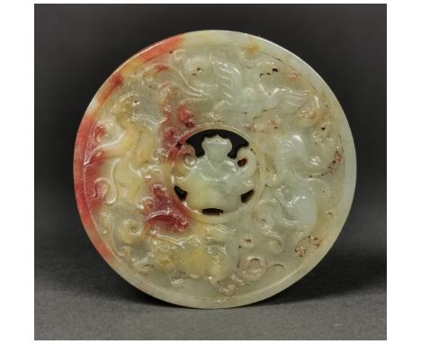 Ca.20th C or earlier / Ming Style. A fantastic example of bi-disc made of a pale-green jade with some natural red layers; car