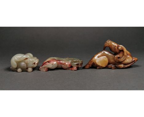 Ca.20th C AD or Earlier / Archaic style. A beautiful collection of three jade figurines; a pale green jade rapresenting Bìxié