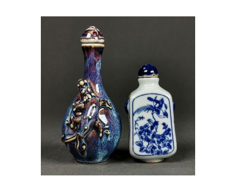 Ca.20th Century AD, Qing Dynasty Style; A pair of two nicely decorated ceramic snuff bottles. A beautiful blue and white porc