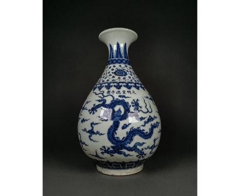 Ca.20th C or earlier; A fine Ming style blue and white pear-shaped vase; a globular body nicely painted in vivid blue tones d