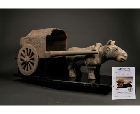 Ca. 206 BC - 220 AD. A very large and rare Han ceramic model of a chariot being pulled by an Ox; Good Condition;Size:600mmx34