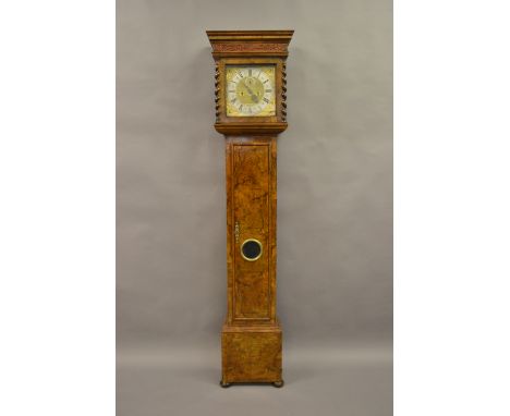 Figured walnut longcase clock with square hood with moulded cornice and fretwork frieze above flanking barley twist pilasters