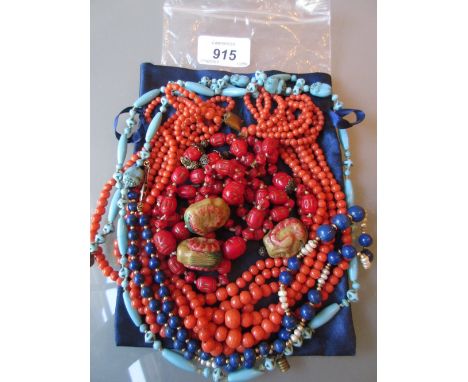 Six strand coral bead necklace together with three other necklaces
