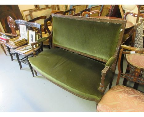 Late 19th or early 20th Century French carved walnut two seat drawing room sofa with green upholstery