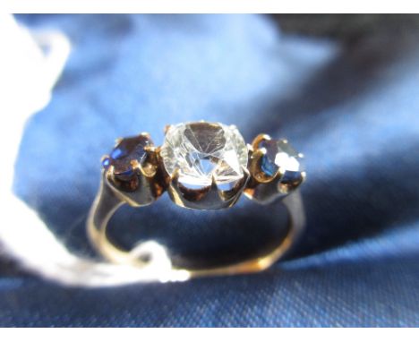 Yellow gold three stone white and blue sapphire ring