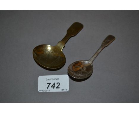 Georgian silver Fiddle pattern caddy spoon with engraved bright cut decoration together with a silver gilt caddy spoon