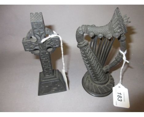 19th Century Irish carved bog oak harp together with a similar Celtic cross