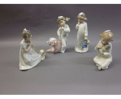 Four various Nao figures of young girls in night gowns
