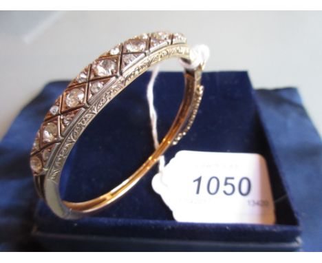 Victorian engraved gold bangle set nineteen old cut diamonds of various sizes