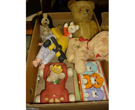 Box containing a collection of various games including Dinky bowling game, Bonny McBonzo teddy bears etc. and three advertisi