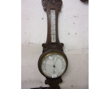 Early 20th Century carved oak aneroid barometer thermometer by Dollond (a/f)