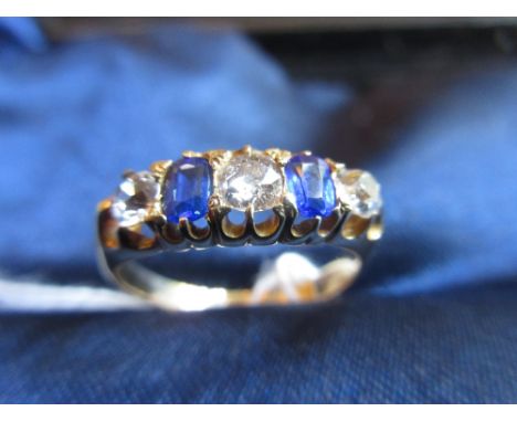 18ct Yellow gold five stone ring set, diamond, zircon and blue stone