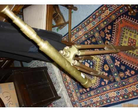 20rh Century brass telescope on a wooden tripod stand