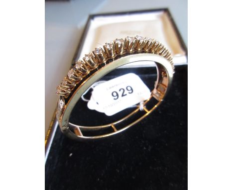 Similar bangle set nineteen smaller graduated brilliant cut diamonds