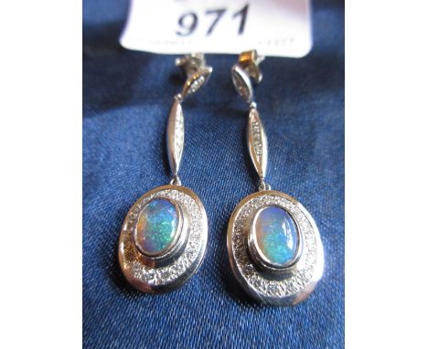 Pair of 18ct white gold, opal and diamond drop earrings