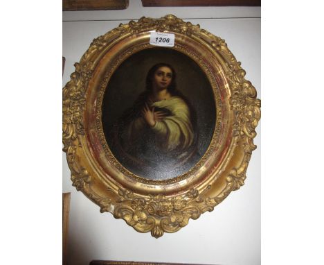 An antique oval gilt framed oil on metal panel, portrait of the Virgin of Madrid