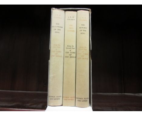 J.R.R. Tolkien, three volumes, ' The Lord of the Rings ', set in a slip case, 7th, 8th and 11th impressions respectively, 196