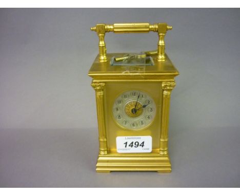 Small late 19th Century gilt brass carriage clock with Corinthian corner pilasters, the silvered dial with Arabic numerals, w