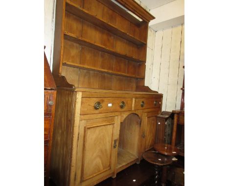 19th Century mahogany dresser with a boarded shelf back above drawers, cupboards and an alcove