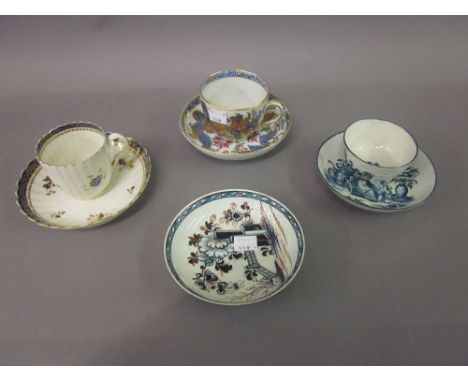 First period Worcester blue and white decorated cup and saucer, an early Salopian cup and saucer and a Newhall tobacco leaf p