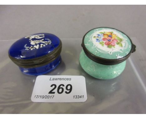 19th Century oval blue enamel patch box decorated with doves, together with another patch box with a floral painted cover