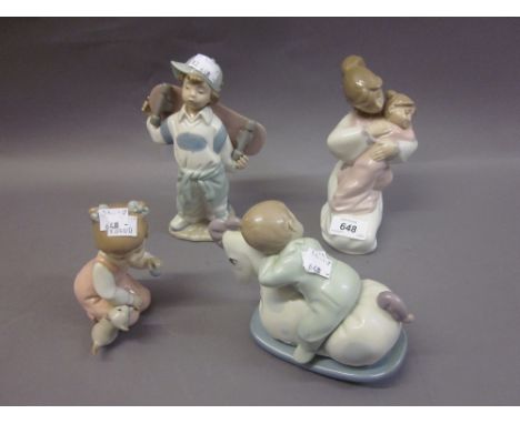 Four Nao figures, kneeling mother and child, young girl with kitten, a boy on a rocking horse and boy with skateboard