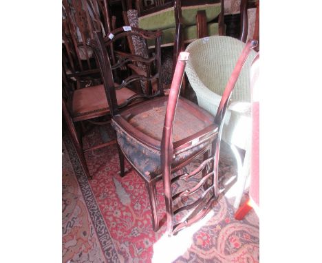 Pair of pierced and carved ladder back side chairs on square reeded and splay front supports together with a 20th Century bee