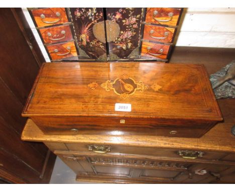 19th Century Swiss musical box, the line inlaid and marquetry lid enclosing an eight air movement with 10.5in cylinder, one p