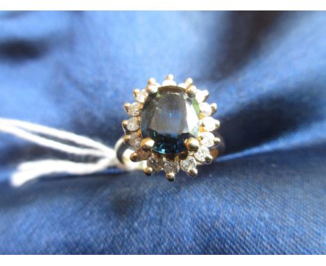 18ct Yellow gold oval sapphire and diamond cluster ring