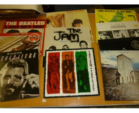 Similar bag containing a quantity of various records including Rolling Stones, Michael Jackson etc.