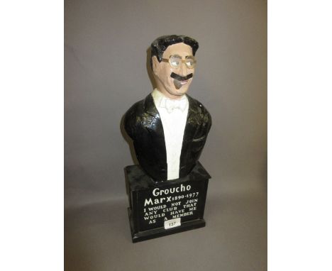 Papier mache figure of Groucho Marx on wooden ebonised plinth