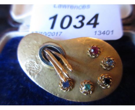 18ct Yellow gold brooch in the form of an artist's palette set ruby, aquamarine, sapphire and emerald