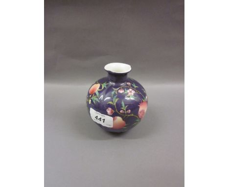 Small 20th Century Chinese porcelain vase decorated with flowers and fruits on a blue ground, seal mark to base, 4ins high